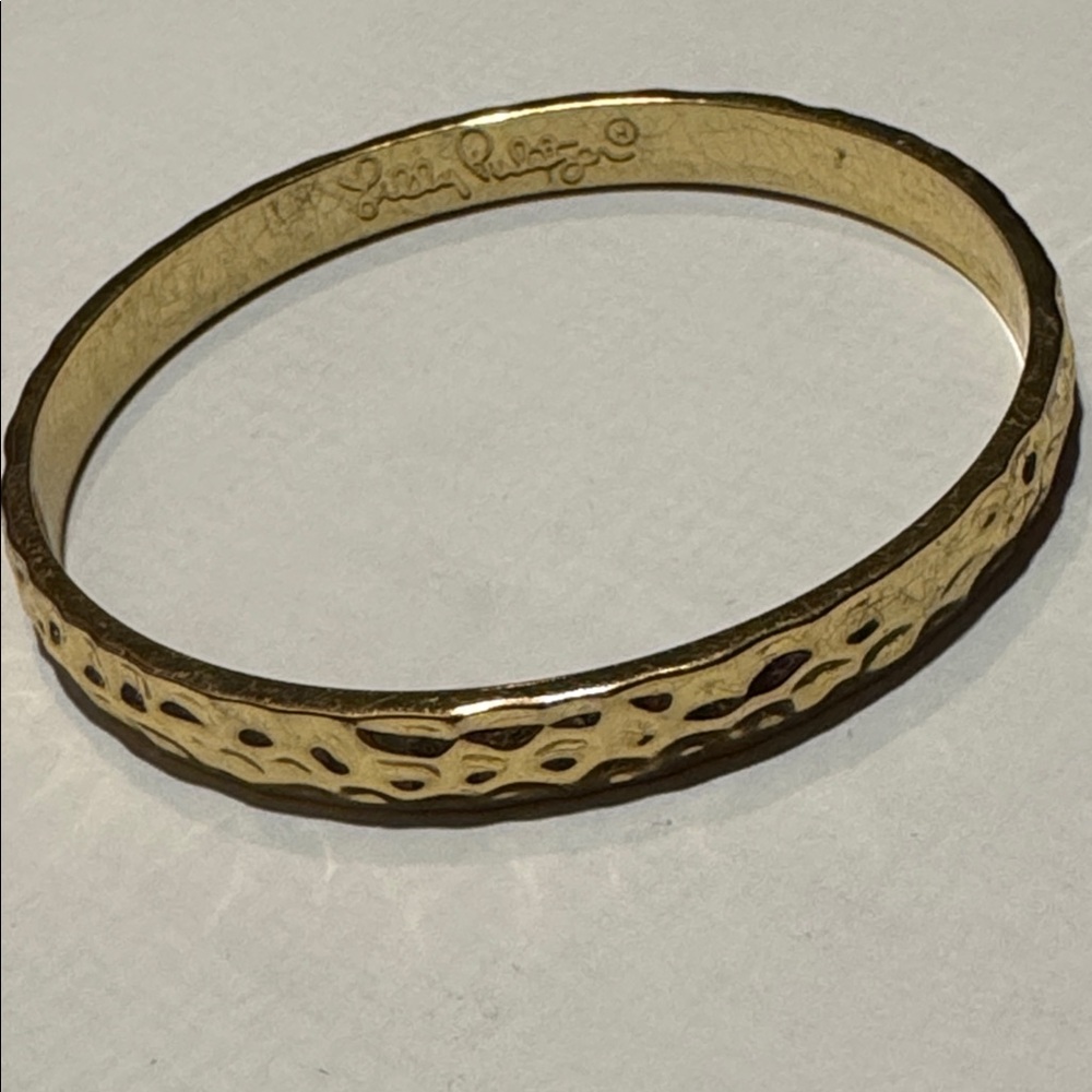 LilyPulitzerGoldToneHammered MetalBangle some imperfections(see photos) 7in
